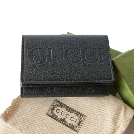 Gucci Embossed Logo Mini Tri-Fold Wallet Black Pebbled Leather available at Queen Bee of Beverly Hills