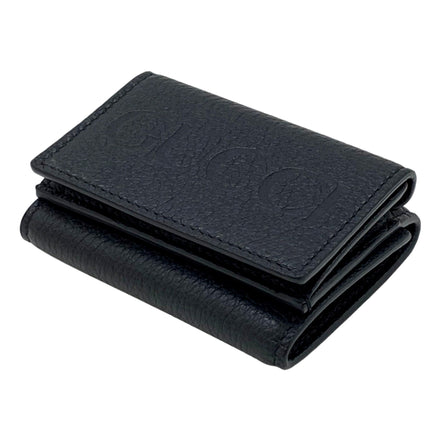 Gucci Embossed Logo Mini Tri-Fold Wallet Black Pebbled Leather available at Queen Bee of Beverly Hills