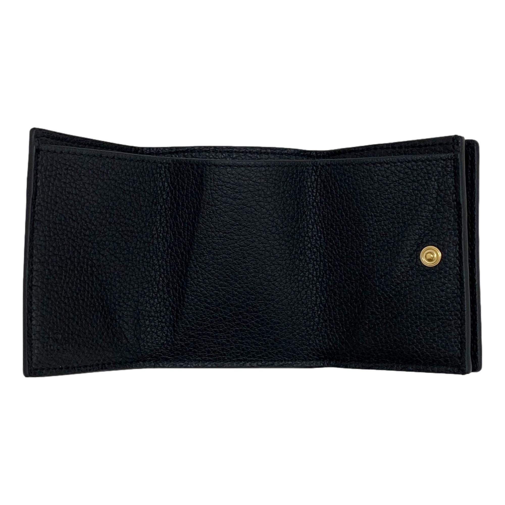 Gucci Embossed Logo Mini Tri-Fold Wallet Black Pebbled Leather available at Queen Bee of Beverly Hills