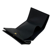 Gucci Embossed Logo Mini Tri-Fold Wallet Black Pebbled Leather available at Queen Bee of Beverly Hills
