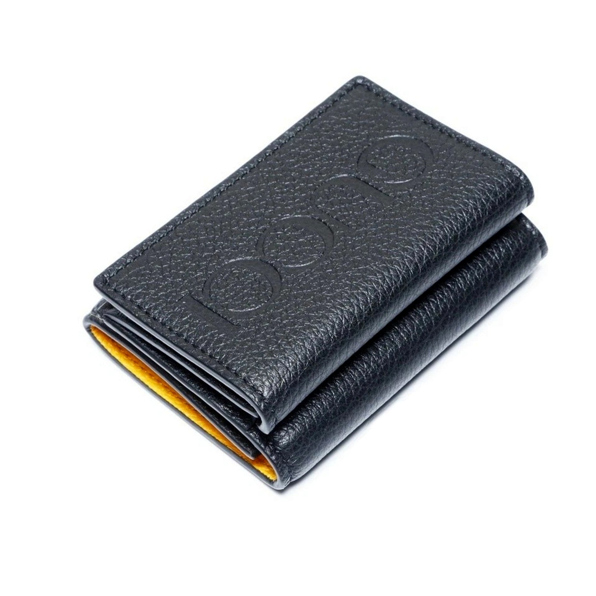 Gucci Embossed Logo Mini Tri-Fold Wallet Black Yellow Pebbled Leather available at Queen Bee of Beverly Hills