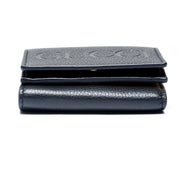 Gucci Embossed Logo Mini Tri-Fold Wallet Black Yellow Pebbled Leather available at Queen Bee of Beverly Hills