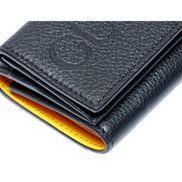 Gucci Embossed Logo Mini Tri-Fold Wallet Black Yellow Pebbled Leather available at Queen Bee of Beverly Hills