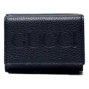 Gucci Embossed Logo Mini Tri-Fold Wallet Black Yellow Pebbled Leather available at Queen Bee of Beverly Hills