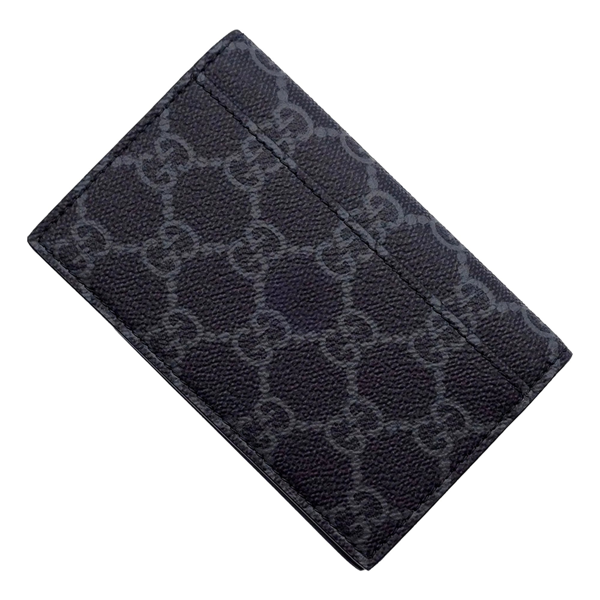 Gucci GG Emblem Black Leather and Canvas Vertical Bifold Wallet - Available at Queen Bee of Beverly Hills