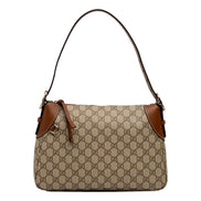 Gucci GG Emblem Surpeme Canvas Medium Leather Shoulder Bag Brown Beige available at Queen Bee of Beverly Hills