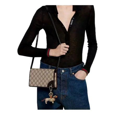 Gucci GG Emblem Canvas and Leather Wallet Mini Crossbody Bag in Black sold at Queen Bee of Beverly Hills