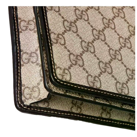 Gucci GG Emblem Canvas and Leather Wallet Mini Crossbody Bag in Black sold at Queen Bee of Beverly Hills