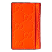Gucci GG Leather Rubber Effect Neon Orange Folding Wallet Card Holder available at Queen Bee of Beverly Hills