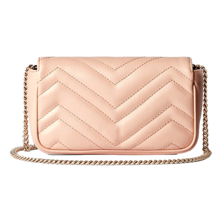 Gucci GG Marmont Super Mini Matelasse Crossbody Bag Light Beige Pink available at Queen Bee of Beverly Hills