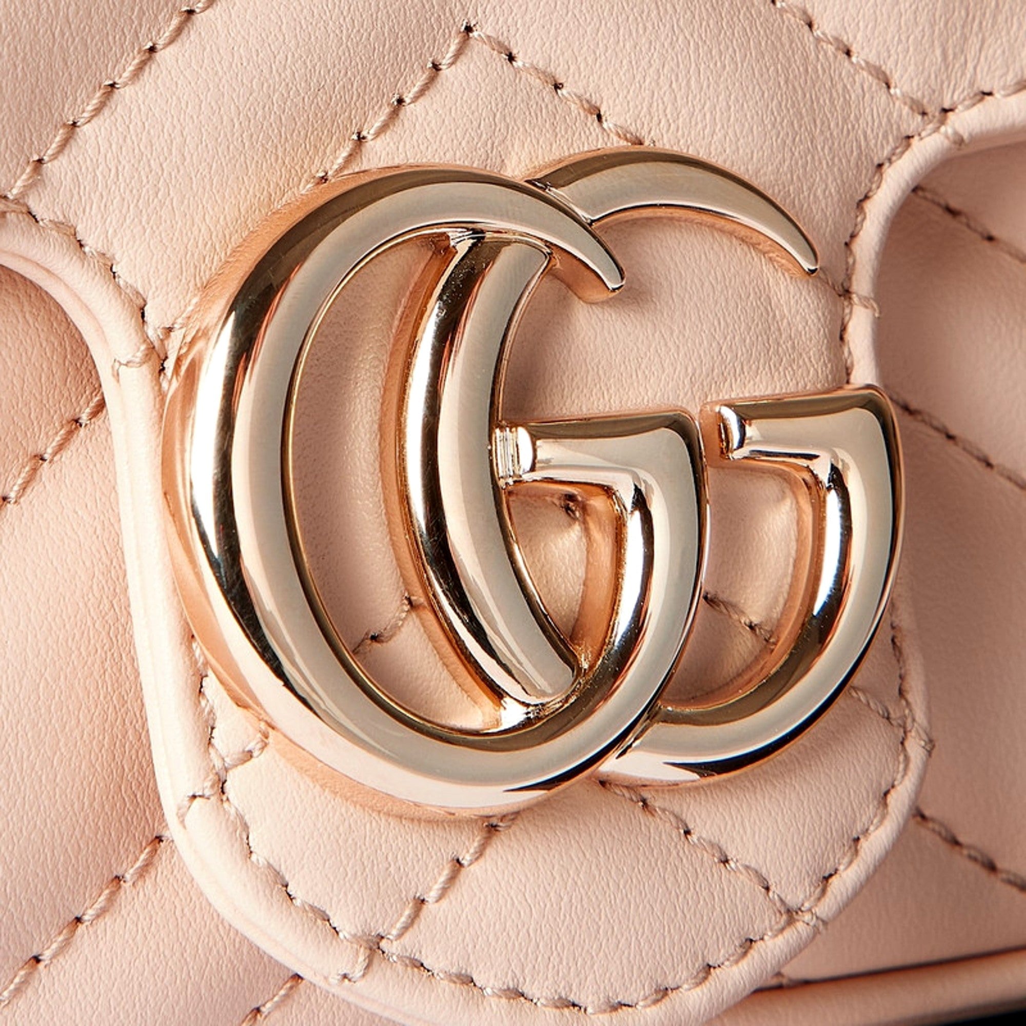 Gucci GG Marmont Super Mini Matelasse Crossbody Bag Light Beige Pink available at Queen Bee of Beverly Hills