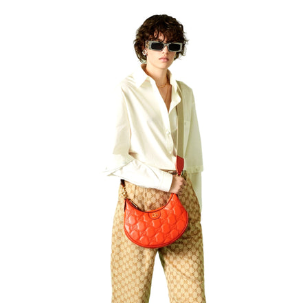 Gucci GG Quilted Matelassé Leather Small Shoulder Handbag In Orange available at Queen Bee of Beverly Hills