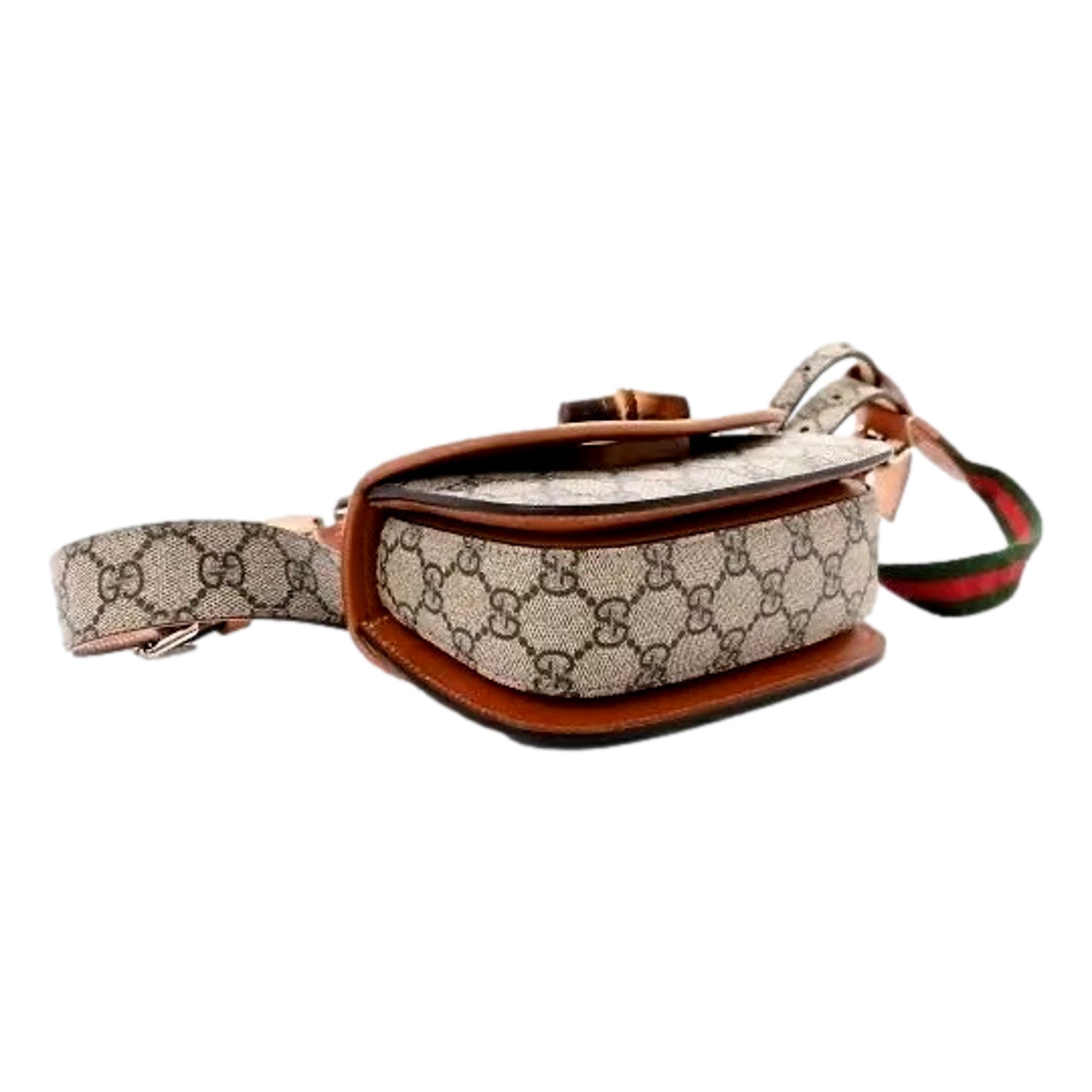 Gucci GG Supreme Monogram Web Bamboo 1947 Mini Belt Bag In Beige 75 available at Queen Bee of Beverly Hills