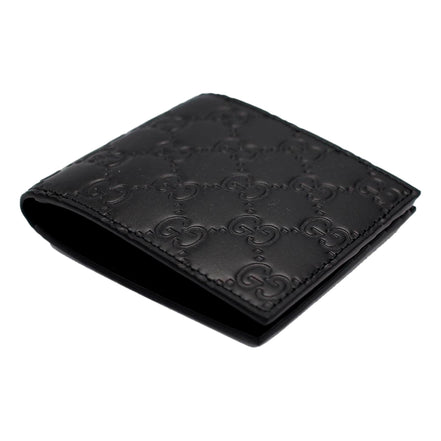 Gucci Guccissima Black Embossed Leather Bifold Wallet available at Queen Bee of Beverly Hills
