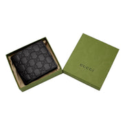 Gucci Guccissima Black Embossed Leather Bifold Wallet available at Queen Bee of Beverly Hills