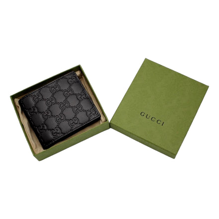Gucci Guccissima Black Embossed Leather Bifold Wallet available at Queen Bee of Beverly Hills