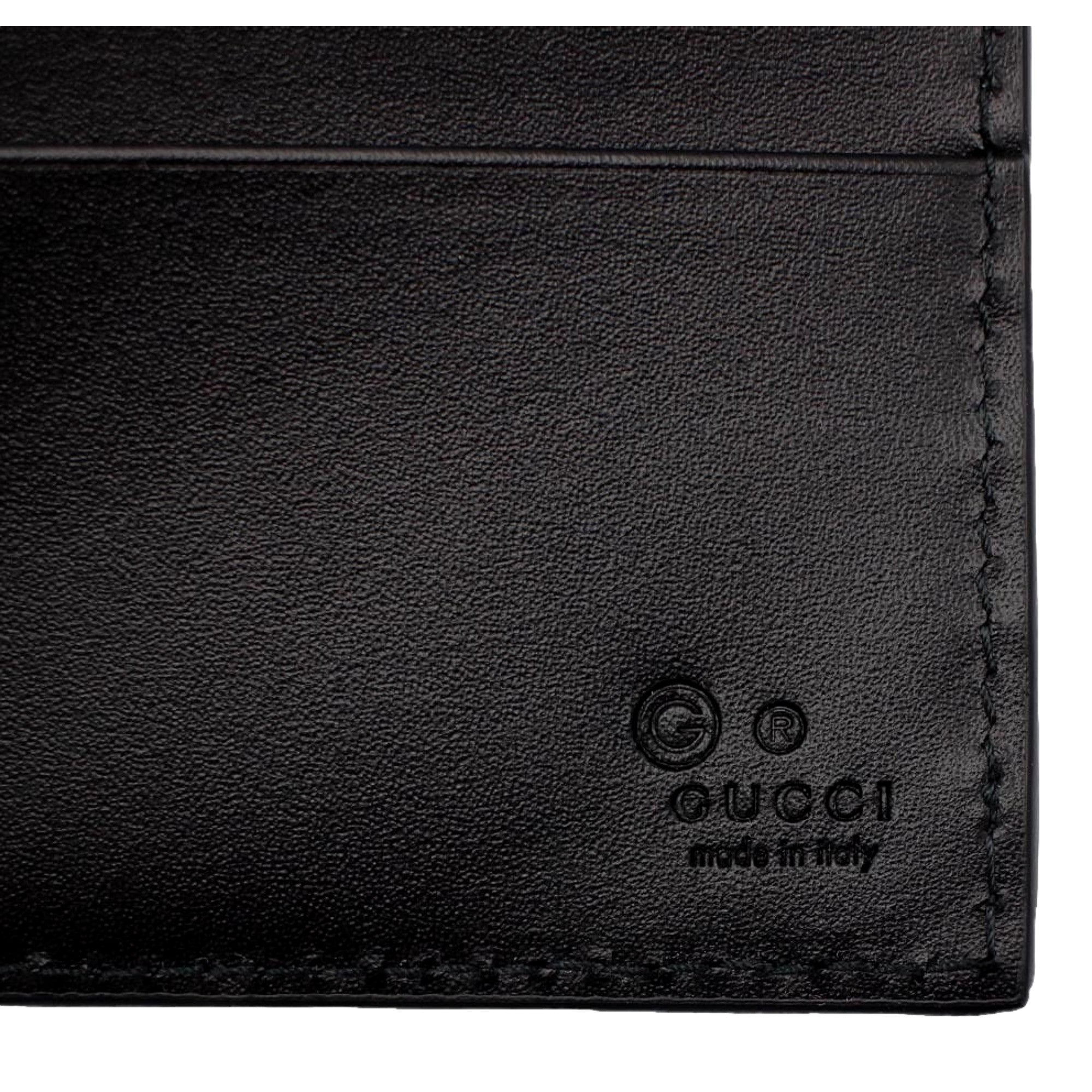 Gucci Guccissima Black Embossed Leather Bifold Wallet available at Queen Bee of Beverly Hills