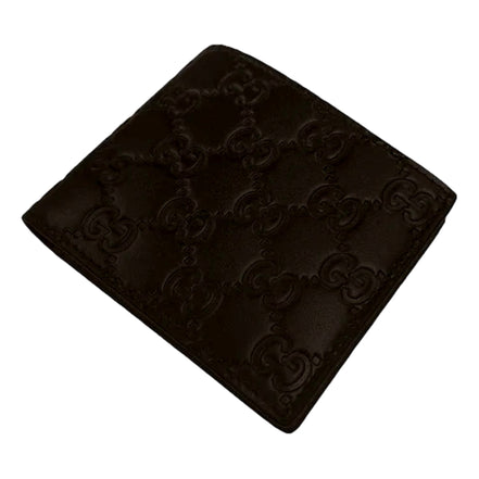 Gucci Guccissima Dark Brown Embossed Leather Bifold Wallet available at Queen Bee of Beverly Hills