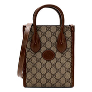 Gucci Interlocking G Leather Emblem Supreme Canvas Brown Leather Mini Shopper Tote sold at Queen Bee of Beverly Hills