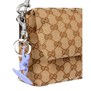 Gucci Engraved Surfer Keychain Charm Lilac Purple sold at Queen Bee of Beverly Hills