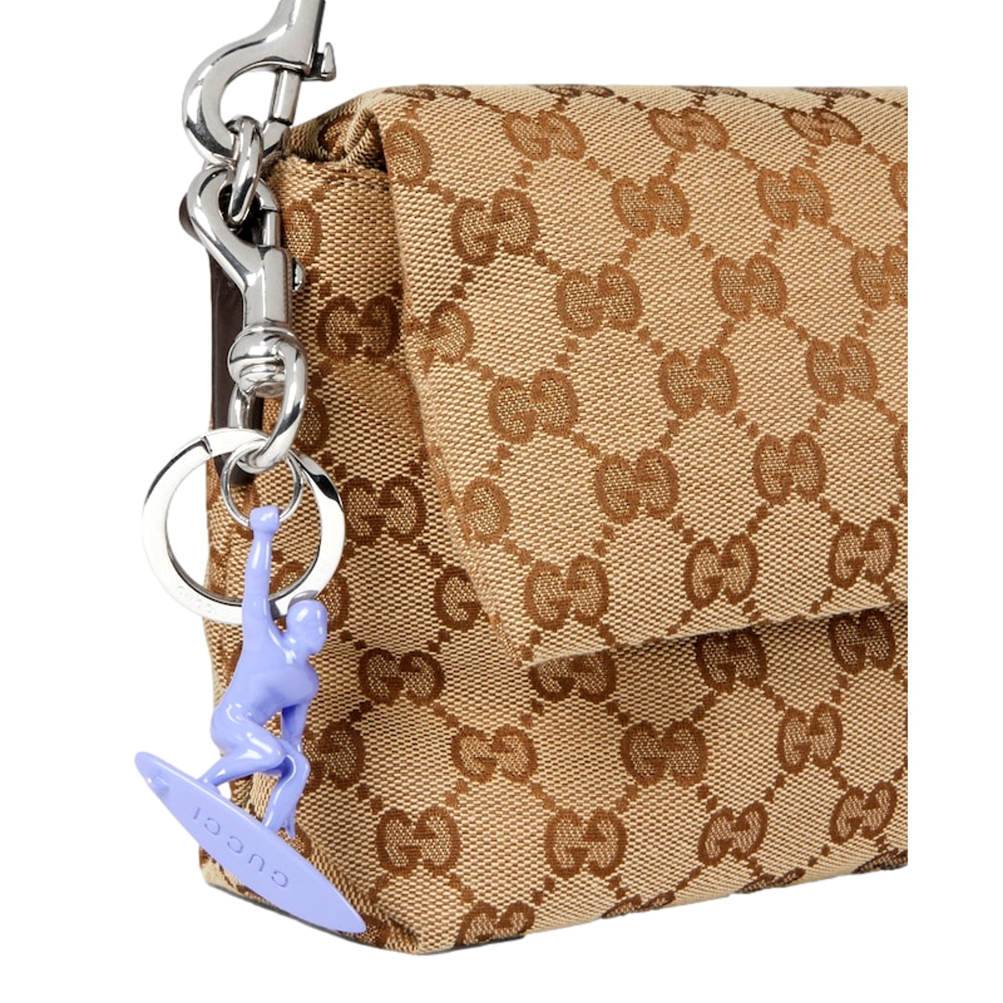 Gucci Engraved Surfer Keychain Charm Lilac Purple sold at Queen Bee of Beverly Hills