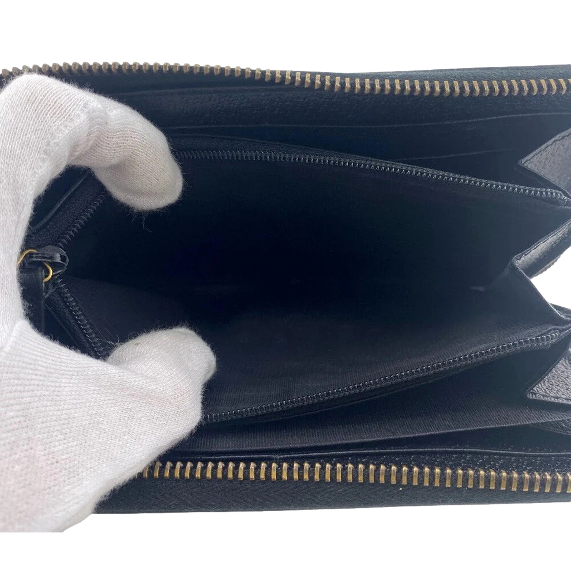 Gucci Marmont Black Leather Continental Zip Around Wallet available at Queen Bee of Beverly Hills