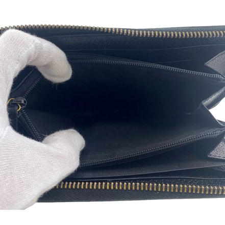 Gucci Marmont Black Leather Continental Zip Around Wallet available at Queen Bee of Beverly Hills