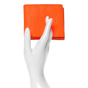 Gucci GG Rubber Effect Neon Orange Guccissima Leather Bifold Wallet sold at Queen Bee of Beverly Hills