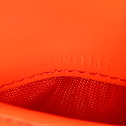 Gucci GG Rubber Effect Neon Orange Guccissima Leather Bifold Wallet sold at Queen Bee of Beverly Hills