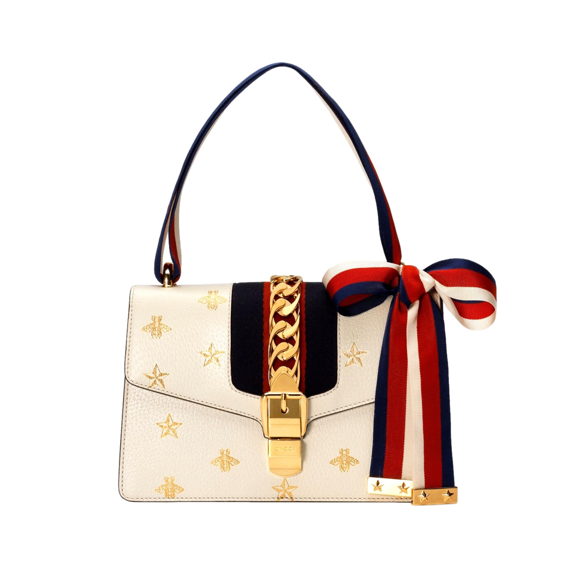 Gucci Sylvie Bee Star Ivory Leather Shoulder Bag available at Queen Bee of Beverly Hills