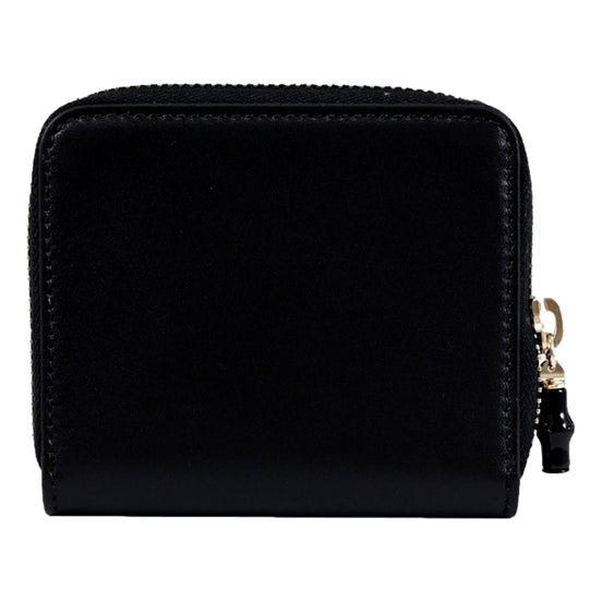 Gucci Black Patent Leather Zip-Around Wallet with Bamboo Pull - available at Queen Bee of Beverly Hills. 