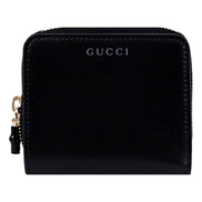 Gucci Black Patent Leather Zip-Around Wallet with Bamboo Pull - available at Queen Bee of Beverly Hills. 