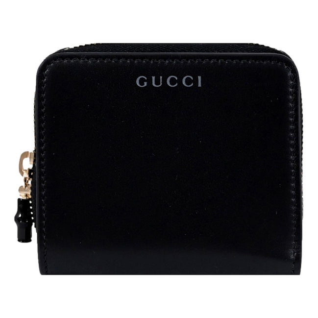 Gucci Black Patent Leather Zip-Around Wallet with Bamboo Pull - available at Queen Bee of Beverly Hills. 
