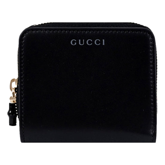 Gucci Black Patent Leather Zip-Around Wallet with Bamboo Pull - available at Queen Bee of Beverly Hills. 
