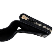 Gucci Black Patent Leather Zip-Around Wallet with Bamboo Pull - available at Queen Bee of Beverly Hills. 