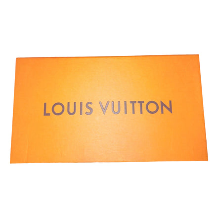 Louis Vuitton Pochette Felicie Monogram Empreinte Leather in Gray - available at Queen Bee of Beverly Hills.