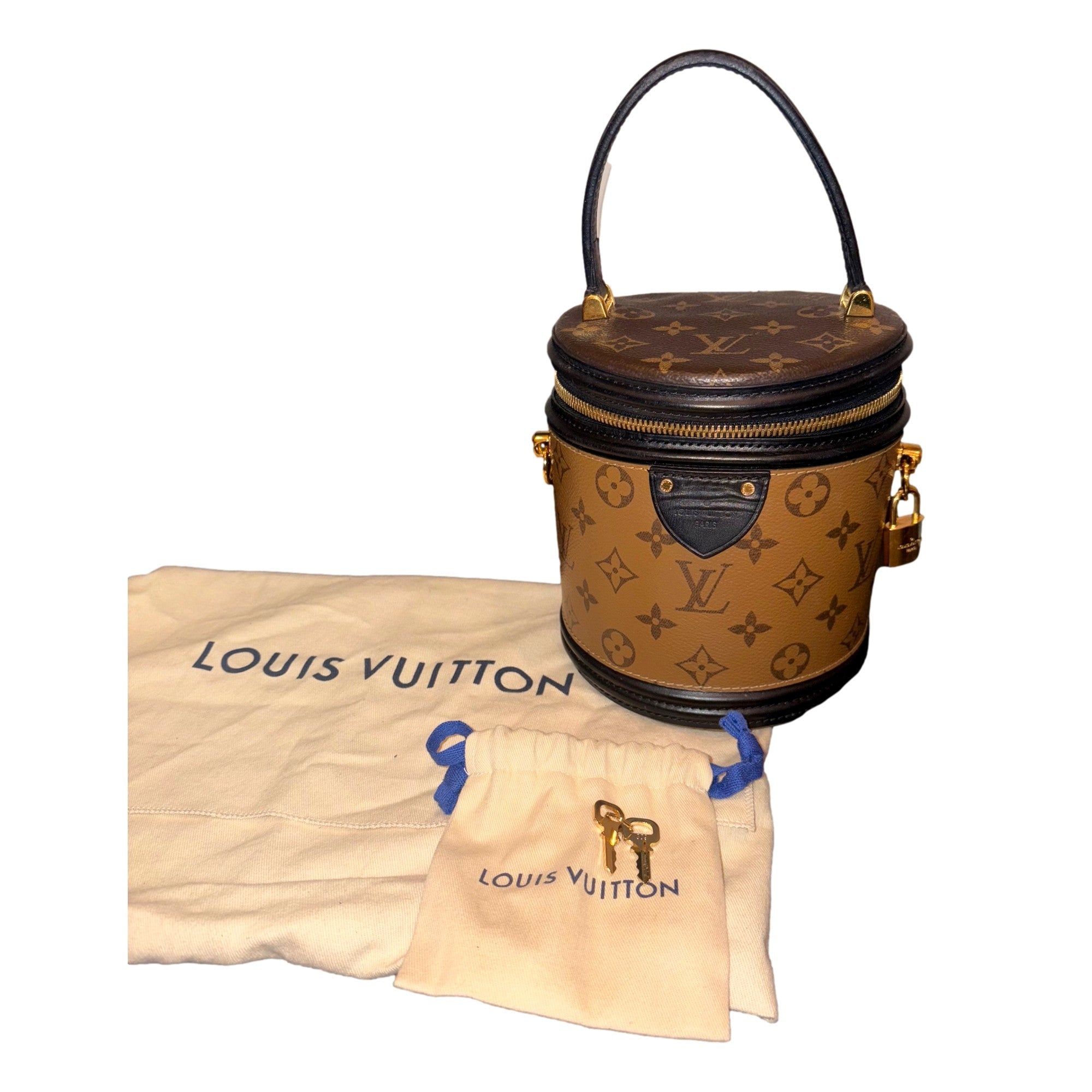 Louis Vuitton Cannes Reverse Monogram Black and Brown Bucket Bag available at Queen Bee of Beverly Hills