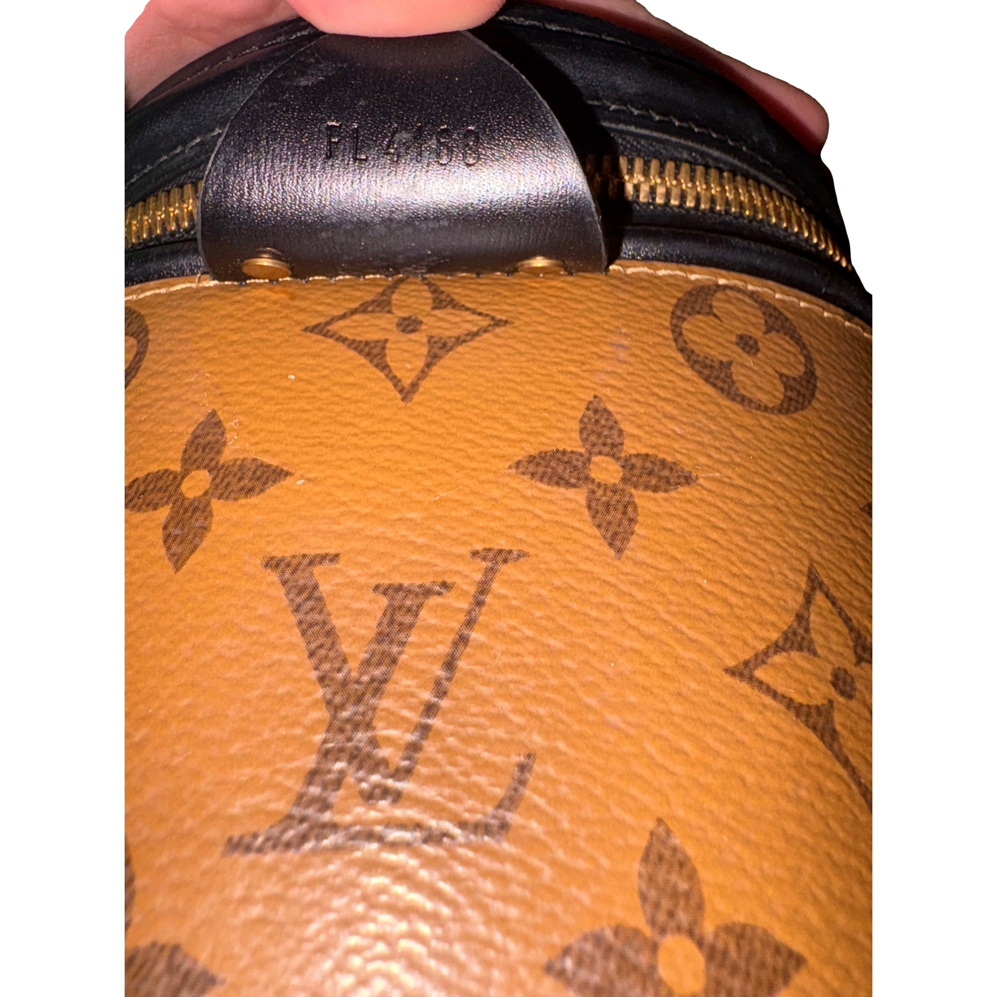Louis Vuitton Cannes Reverse Monogram Black and Brown Bucket Bag available at Queen Bee of Beverly Hills