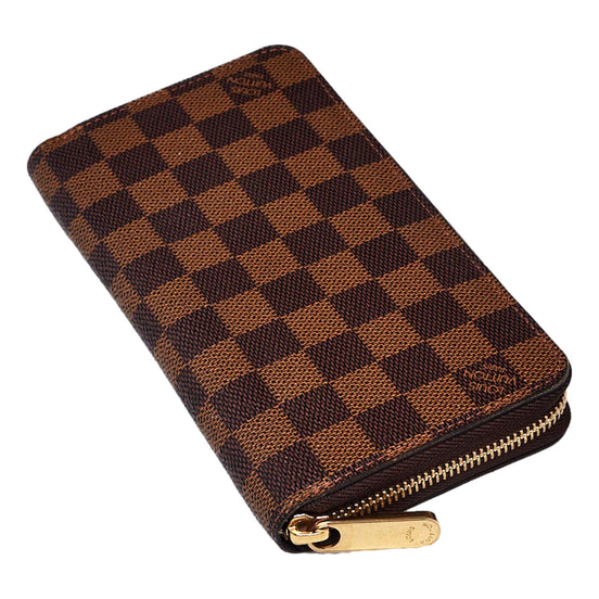 Louis Vuitton Zippy in Damier Ebene sold at Queen Bee of Beverly Hills