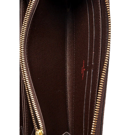 Louis Vuitton Zippy in Damier Ebene sold at Queen Bee of Beverly Hills