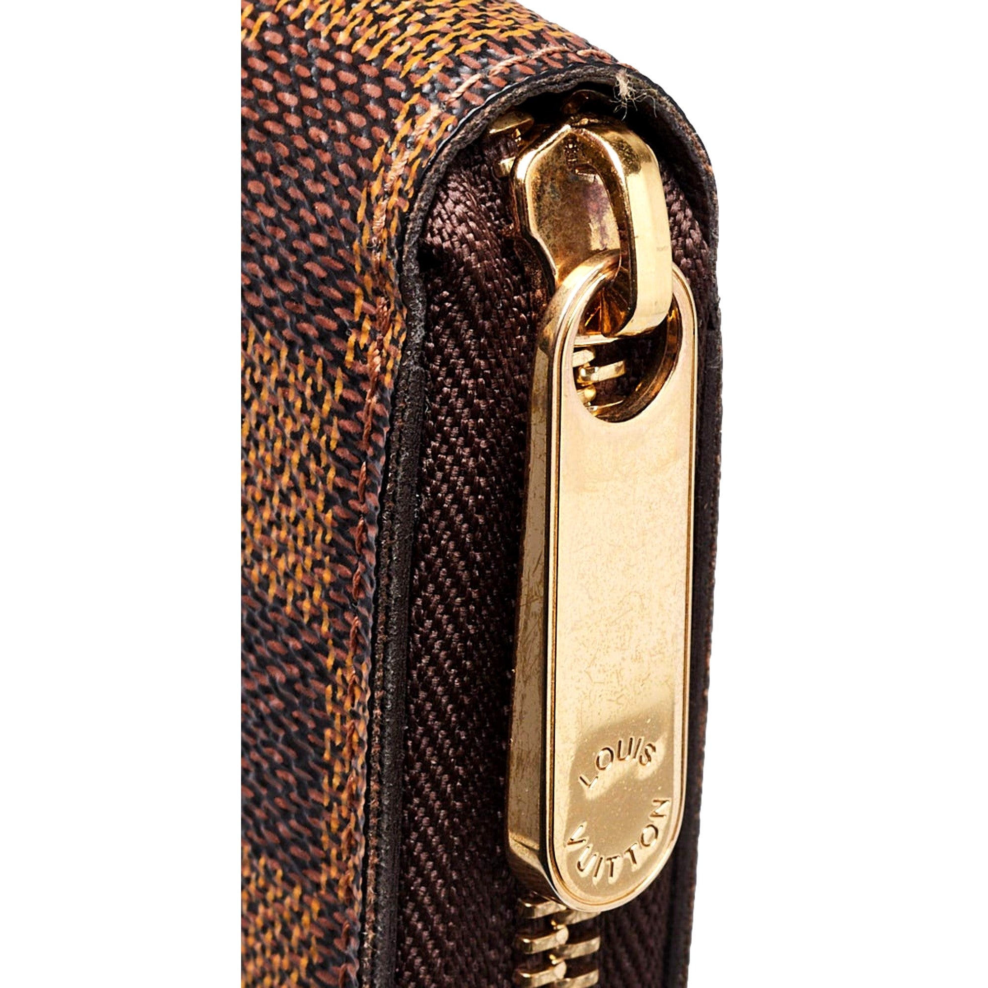 Louis Vuitton Zippy in Damier Ebene sold at Queen Bee of Beverly Hills