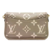 Louis Vuitton Diane Beige Monogram Empreinte Leather Crossbody Bag - available at Queen Bee of Beverly Hills. 