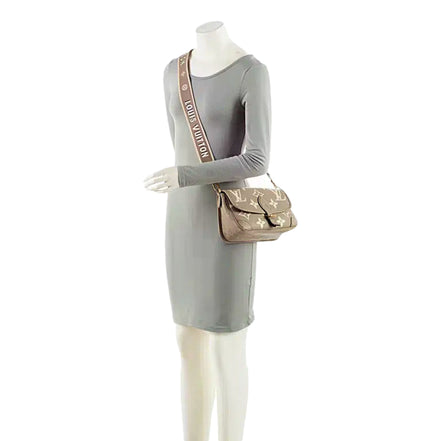 Louis Vuitton Diane Beige Monogram Empreinte Leather Crossbody Bag - available at Queen Bee of Beverly Hills. 