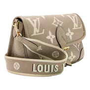 Louis Vuitton Diane Beige Monogram Empreinte Leather Crossbody Bag - available at Queen Bee of Beverly Hills. 
