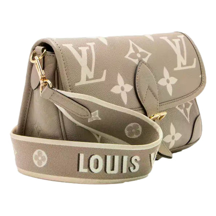 Louis Vuitton Diane Beige Monogram Empreinte Leather Crossbody Bag - available at Queen Bee of Beverly Hills. 