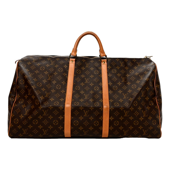 Louis Vuitton Keepall Bandoulière 60 Monogram Canvas Duffle Bag - available at Queen Bee of Beverly Hills. 