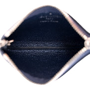 Louis Vuitton Metallic Empreinte Monogram Giant Key Pouch Navy Nacre available at Queen Bee of Beverly Hills