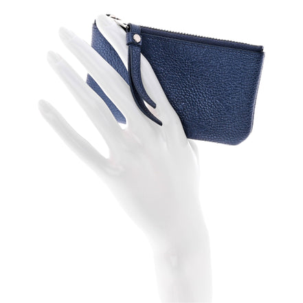 Louis Vuitton Metallic Empreinte Monogram Giant Key Pouch Navy Nacre available at Queen Bee of Beverly Hills