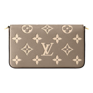Louis Vuitton Pochette Felicie Monogram Empreinte Leather in Gray - available at Queen Bee of Beverly Hills.