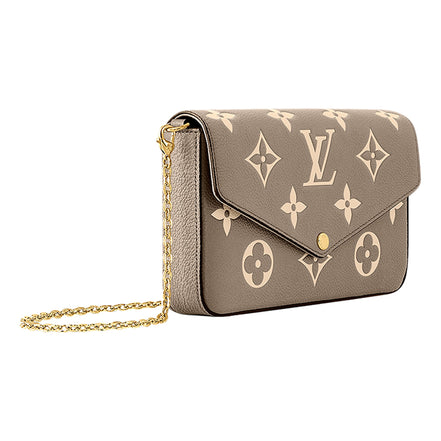 Louis Vuitton Pochette Felicie Monogram Empreinte Leather in Gray - available at Queen Bee of Beverly Hills.